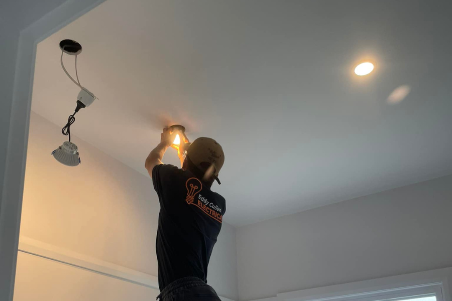 Southern Highlands electrician installing lights.