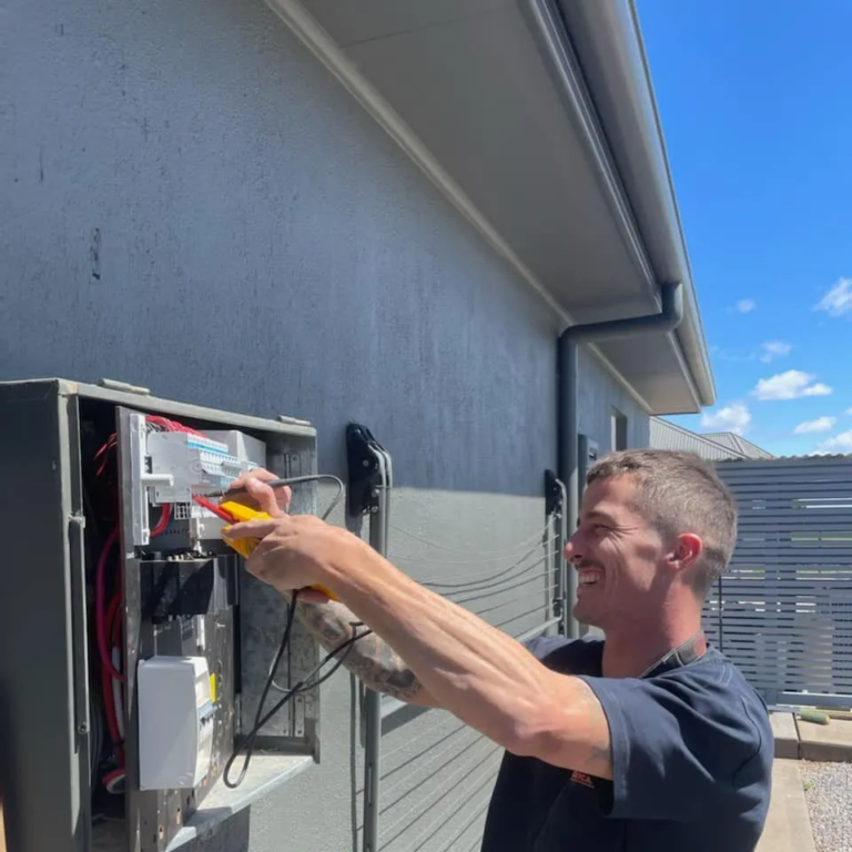 An Eddy Cullen Electrical technician on a residential job, conducting data and communication electrical repairs.
