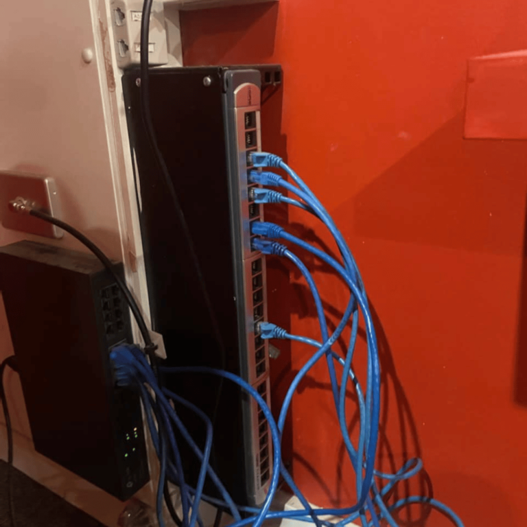 An Eddy Cullen Electrician conducting an NBN installation as part of our data and communication electrical services.