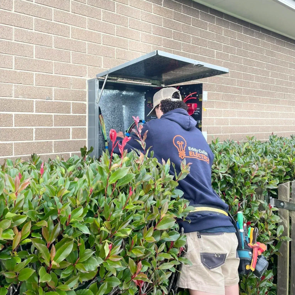 An Eddy Cullen emergency electrician repairing a blown fuse.