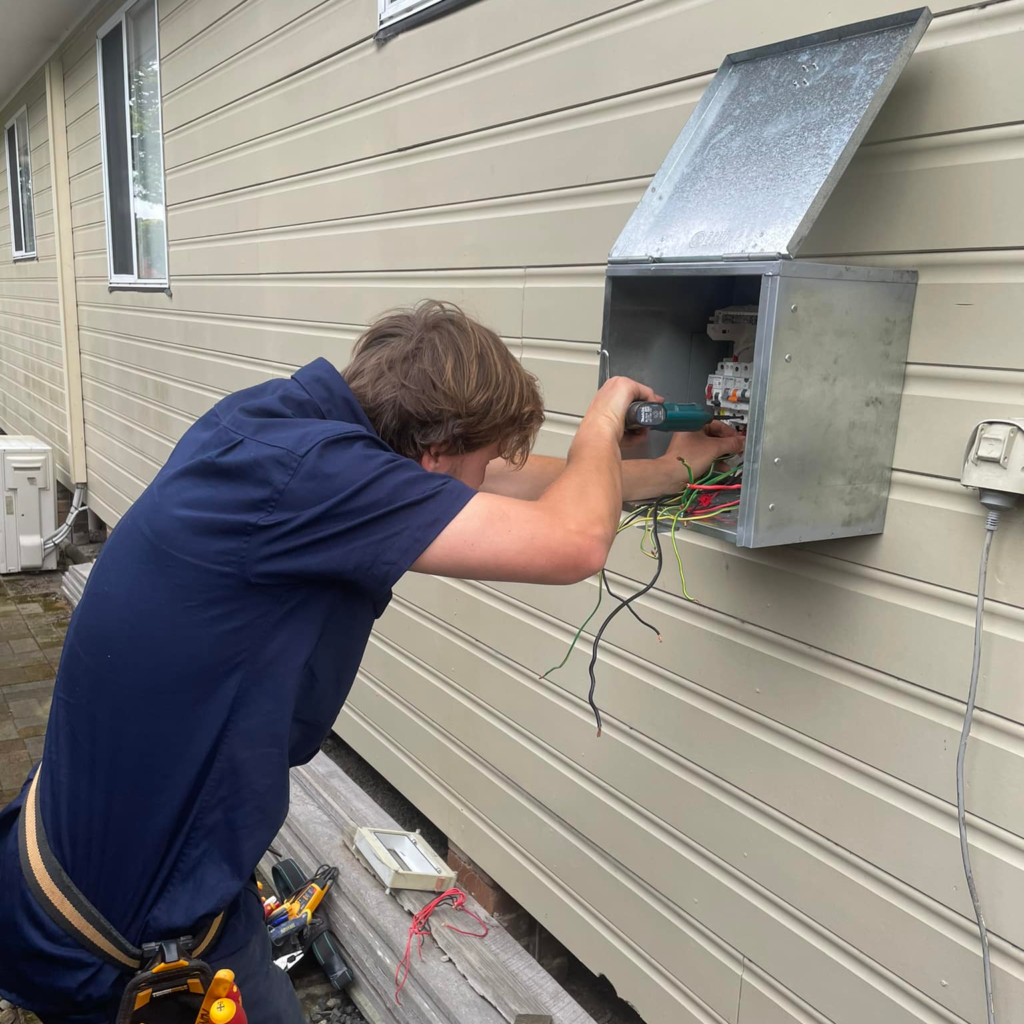 Eddy Cullen Electrical technician working on a safety switch (RCD) installation on a residential property in Bowral.